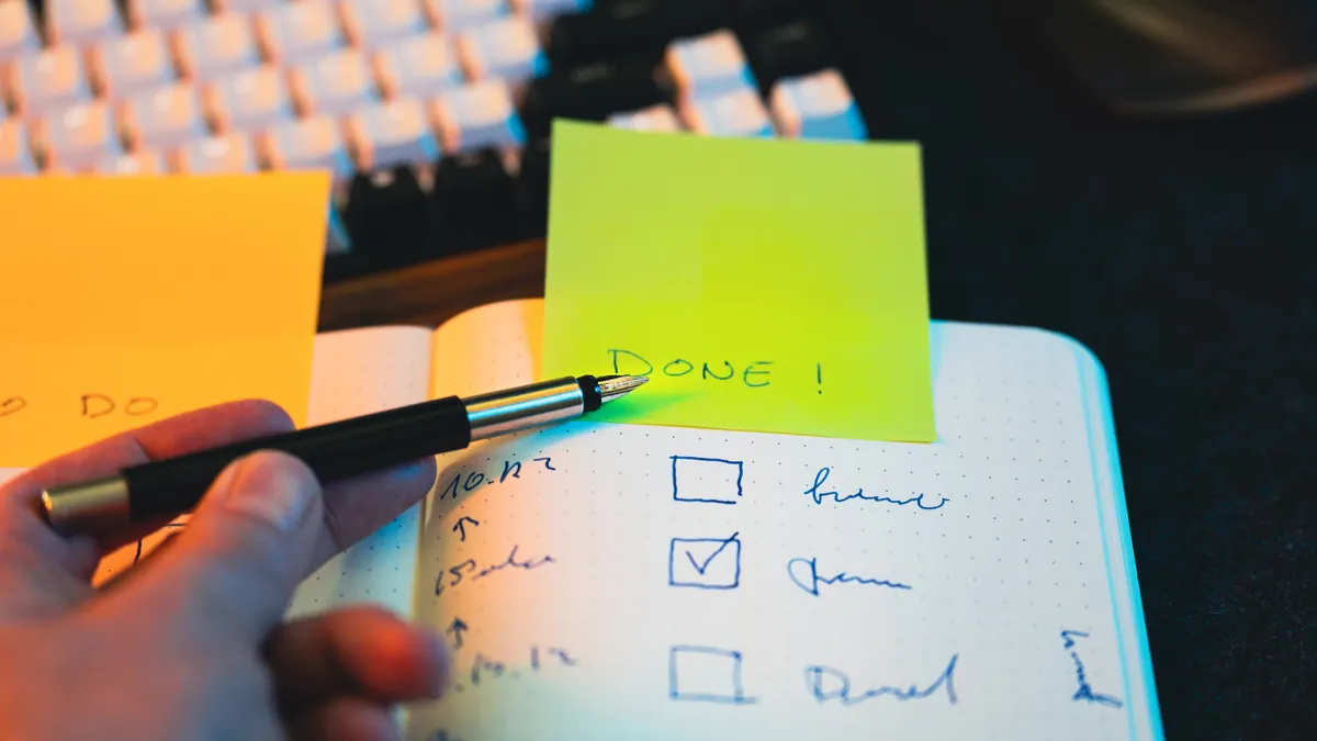 Selecting & Implementing Professional AI Writing Tools — The Complete Guide — Hand Writing in Notebook with Checklist an