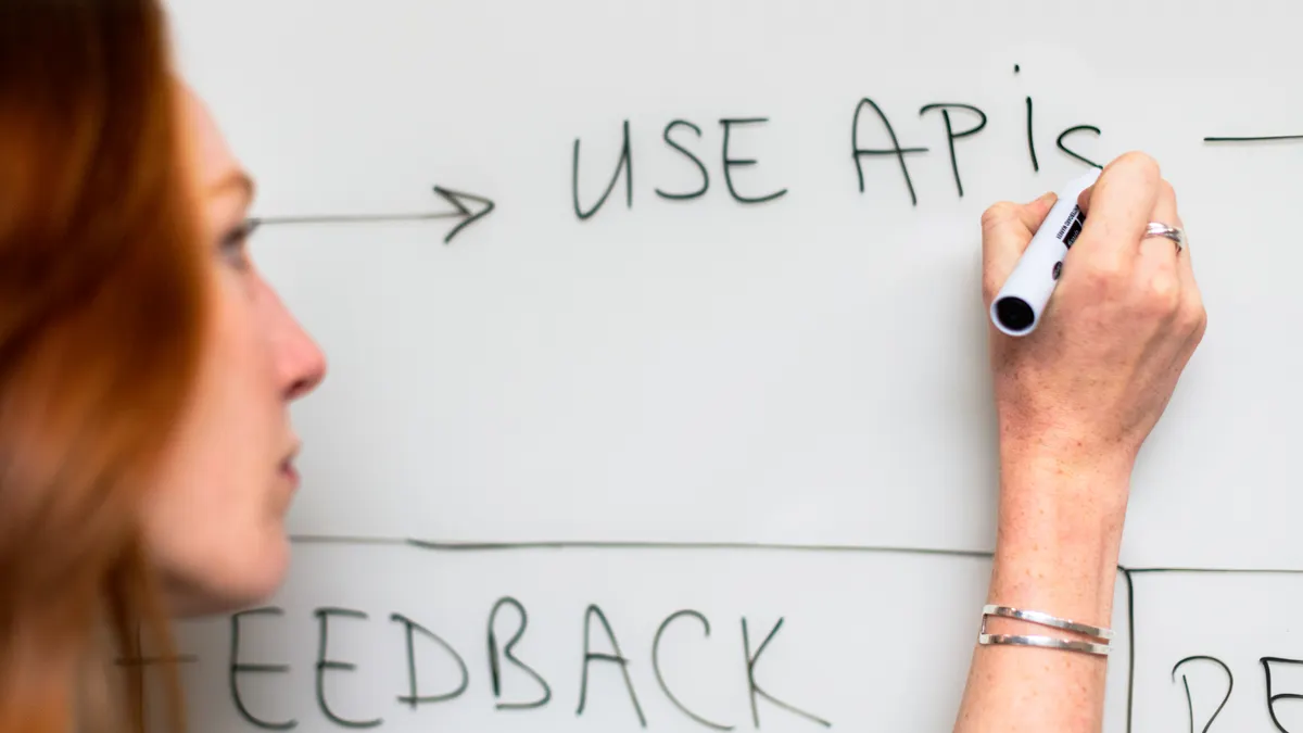 SEO-safe workflows: using AI writing tools to draft search-optimized content without harming rankings — Woman Writing on